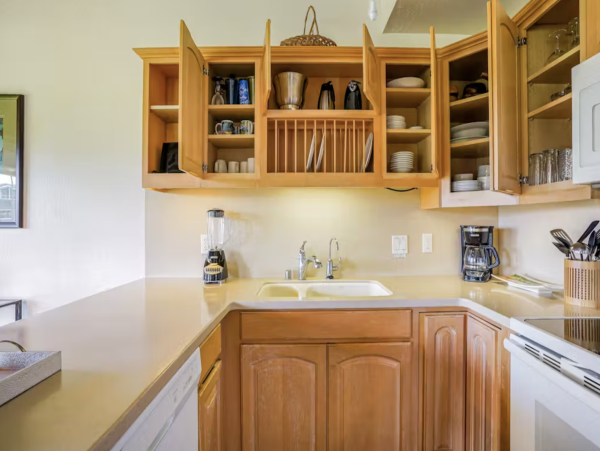 Luxury Poipu Kauai Vacation Rental  Ocean View Top-Floor Condo Near Brennecke’s Beach